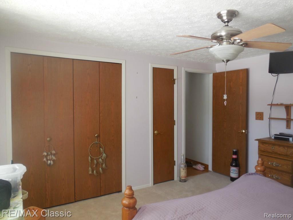 58541 Travis Road New Hudson, MI 48165 - Photo 12 of 24 Mastercloset.jpg