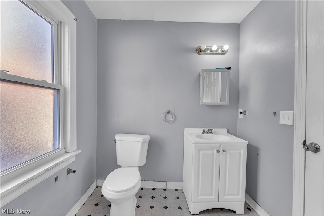 1858 Rudwick Road Cleveland, OH 44112 - Photo 22 of 36 Spare room with light wood finished floors and crown molding