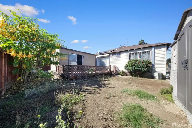 a house view with a garden space