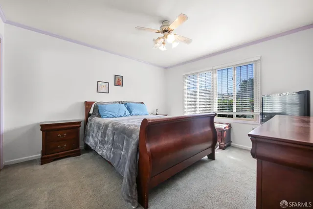 a bed room with a bed and a couch