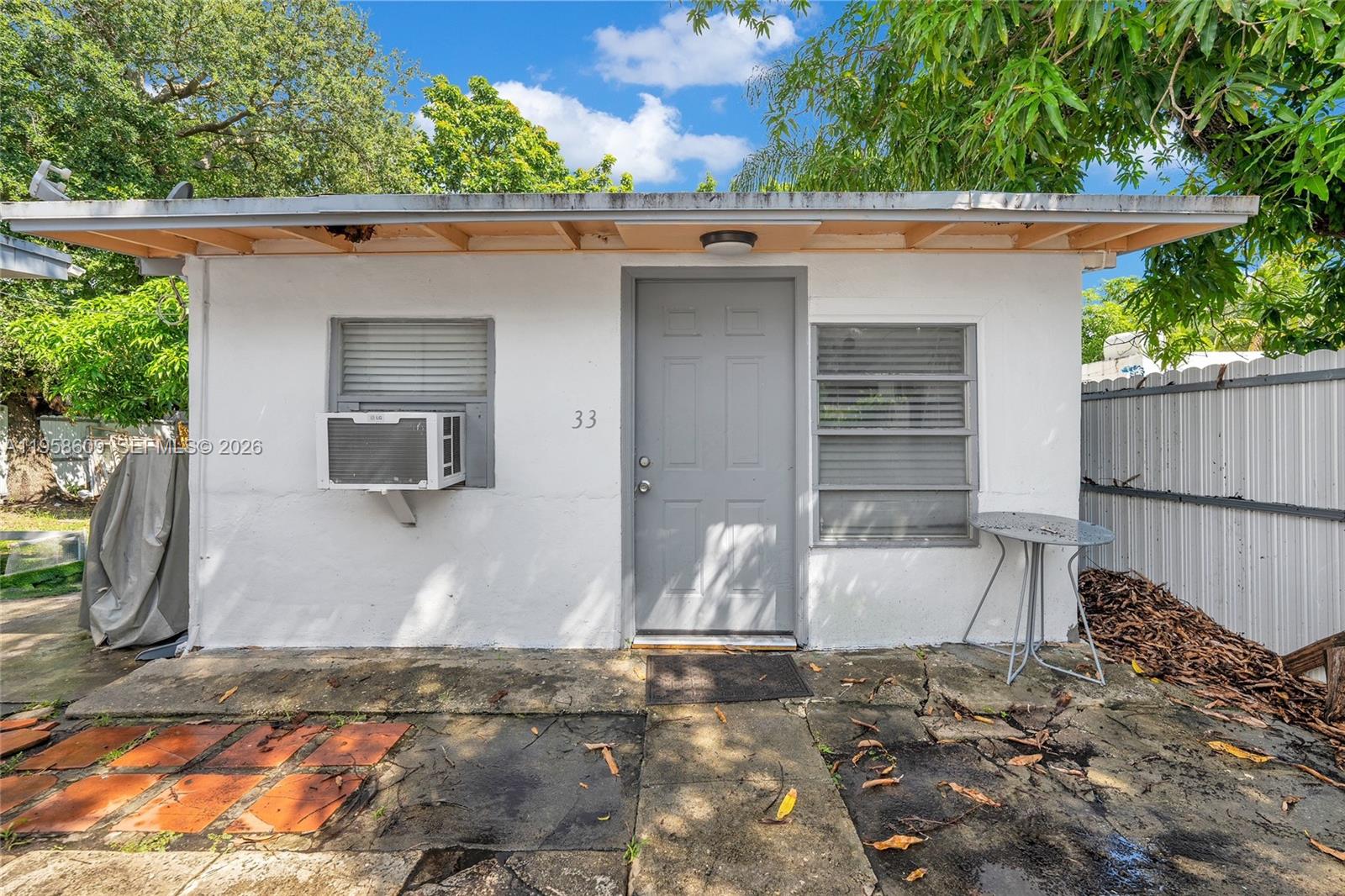 35 Northwest 57th Street Miami, FL 33127 - Photo 4 of 7 a view of back yard of the house