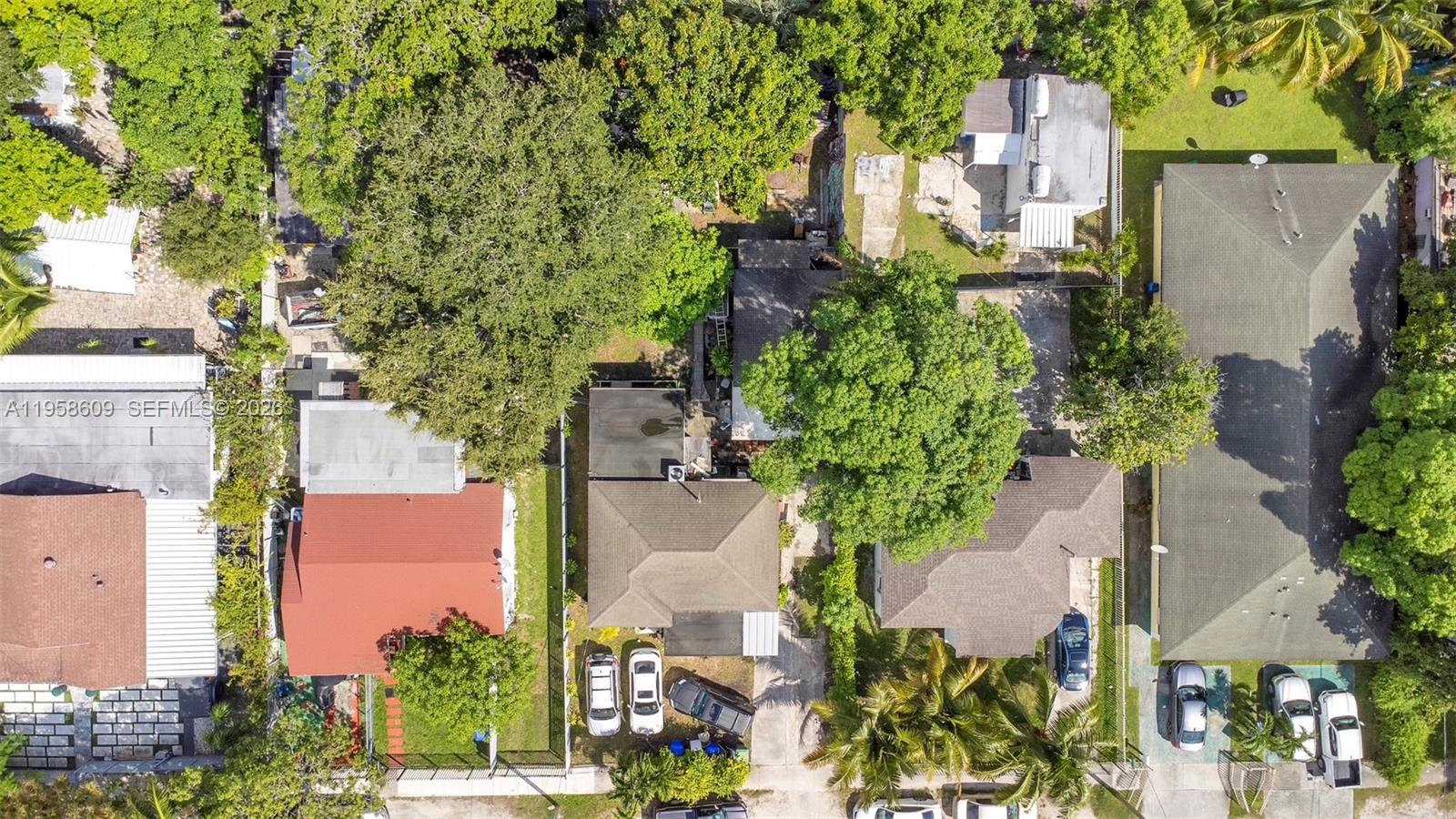 35 Northwest 57th Street Miami, FL 33127 - Photo 6 of 7 an aerial view of a house with a yard and garden