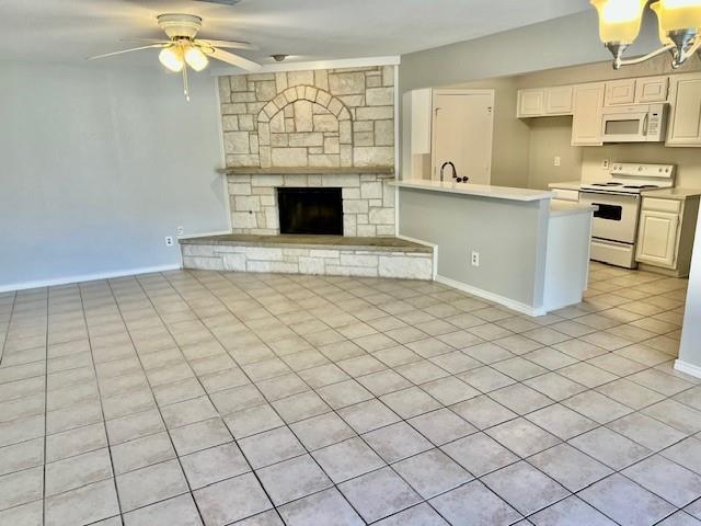 138 East Bethel School Road Coppell, TX 75019 - Photo 1 of 14 a view of kitchen with granite countertop stove top oven and cabinets