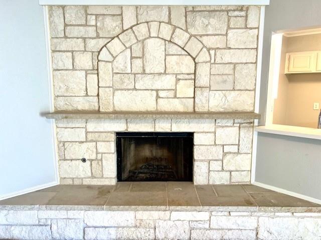 138 East Bethel School Road Coppell, TX 75019 - Photo 2 of 14 a living room with a fireplace and a window