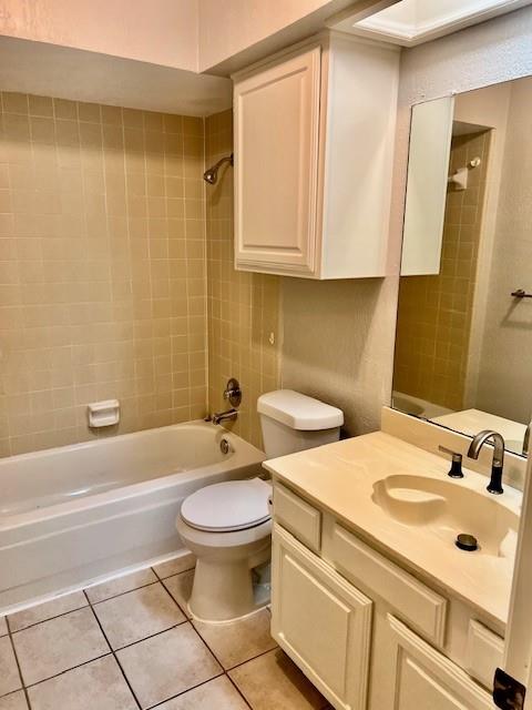 138 East Bethel School Road Coppell, TX 75019 - Photo 8 of 14 a bathroom with a sink toilet and shower