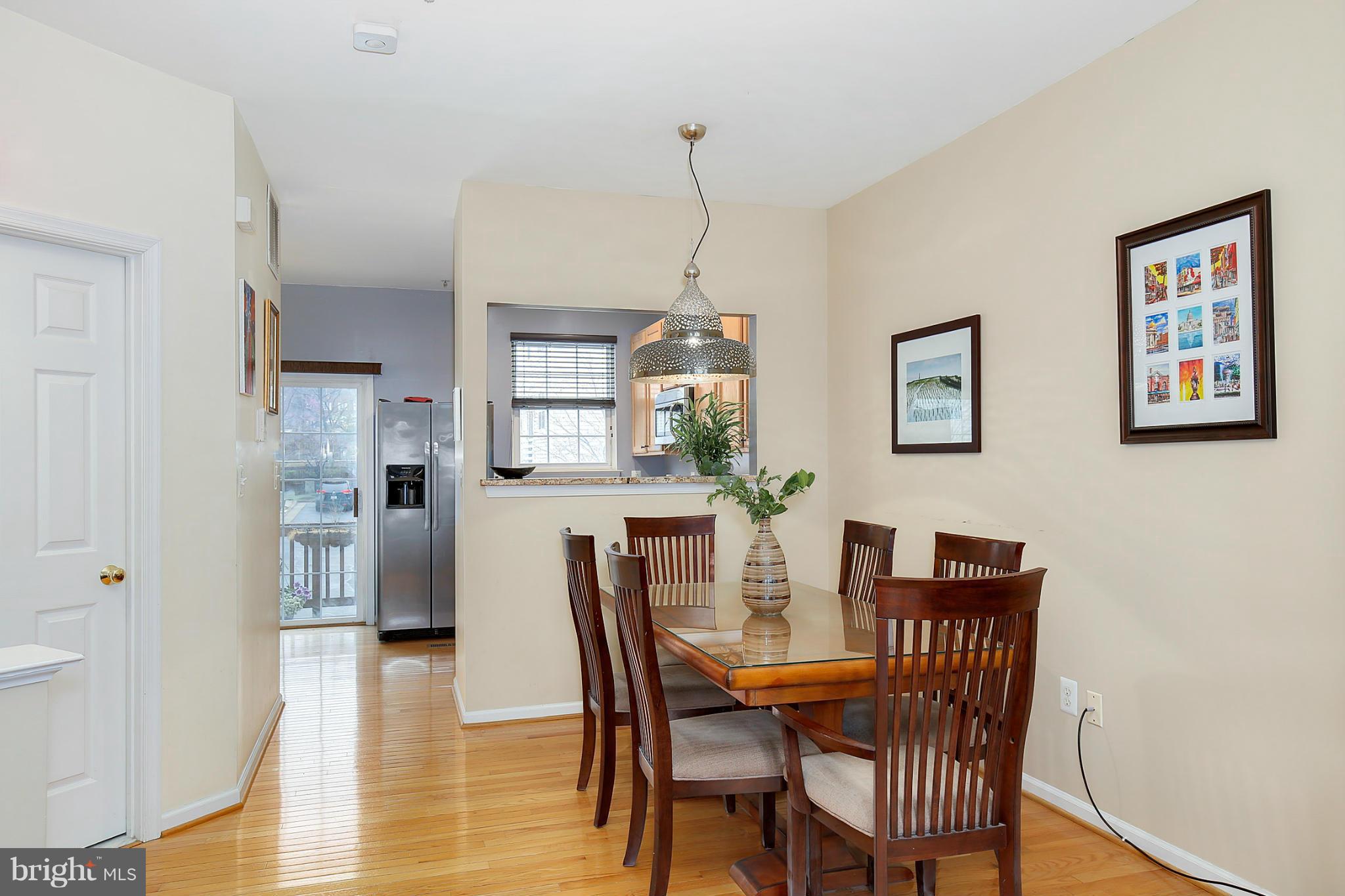5806 Summers Grove Road Alexandria, VA 22304 - Photo 19 of 30 a dining room with furniture and window