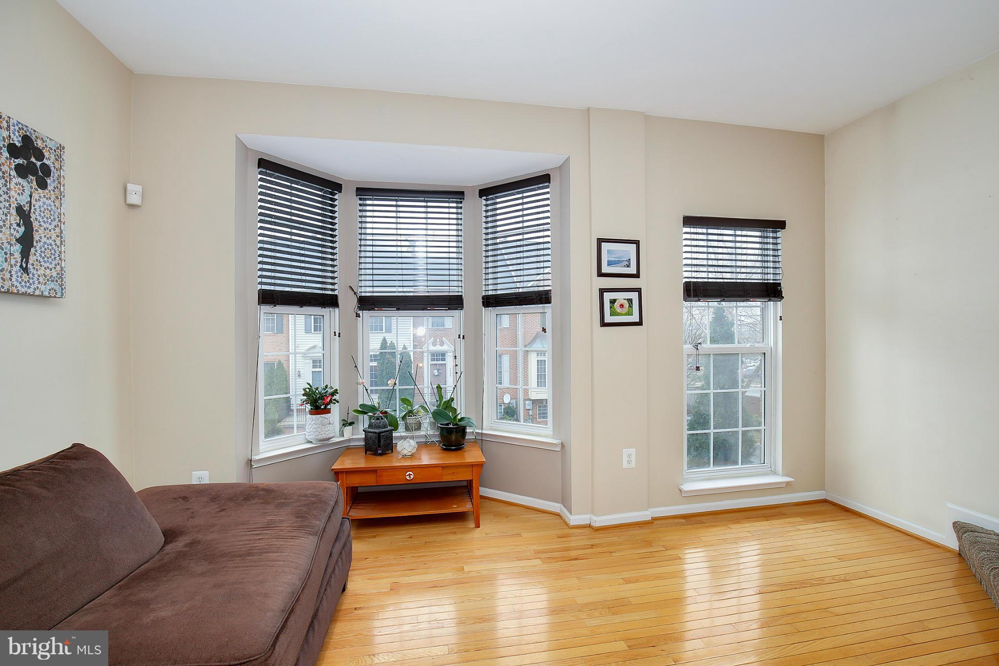 5806 Summers Grove Road Alexandria, VA 22304 - Photo 20 of 30 a living room with furniture and a window