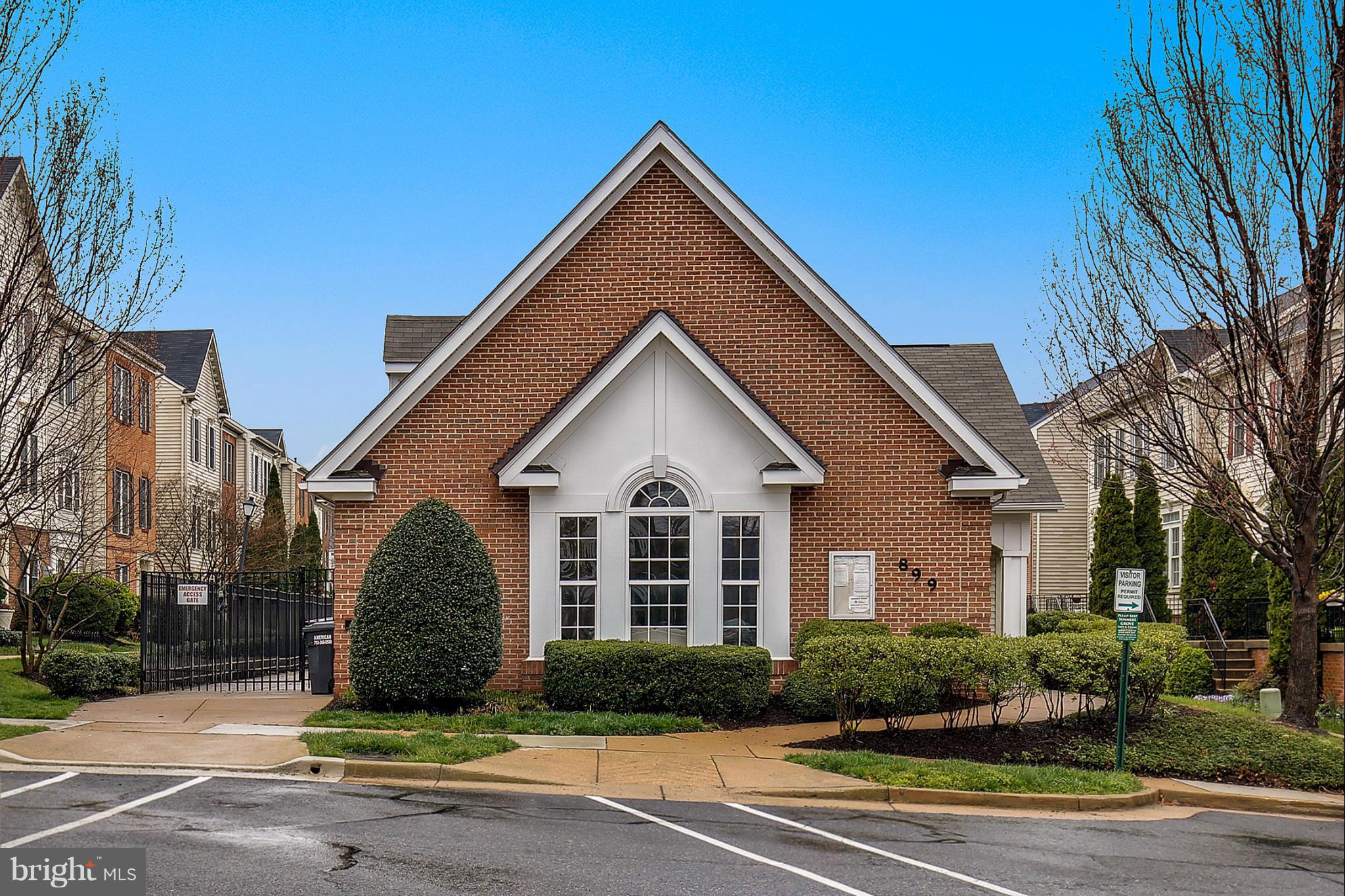 5806 Summers Grove Road Alexandria, VA 22304 - Photo 29 of 30 a front view of a house with a yard