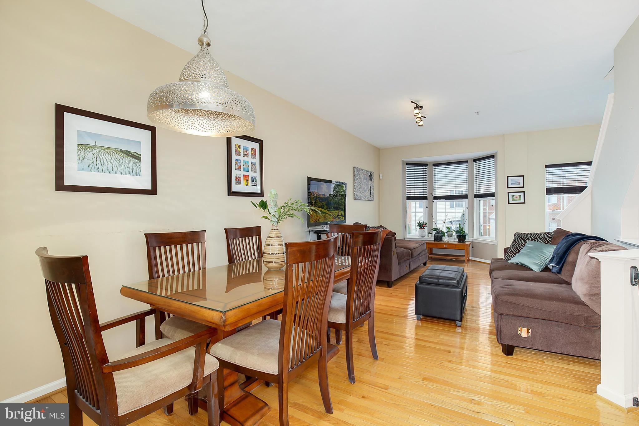 5806 Summers Grove Road Alexandria, VA 22304 - Photo 7 of 30 a living room with furniture and a wooden floor