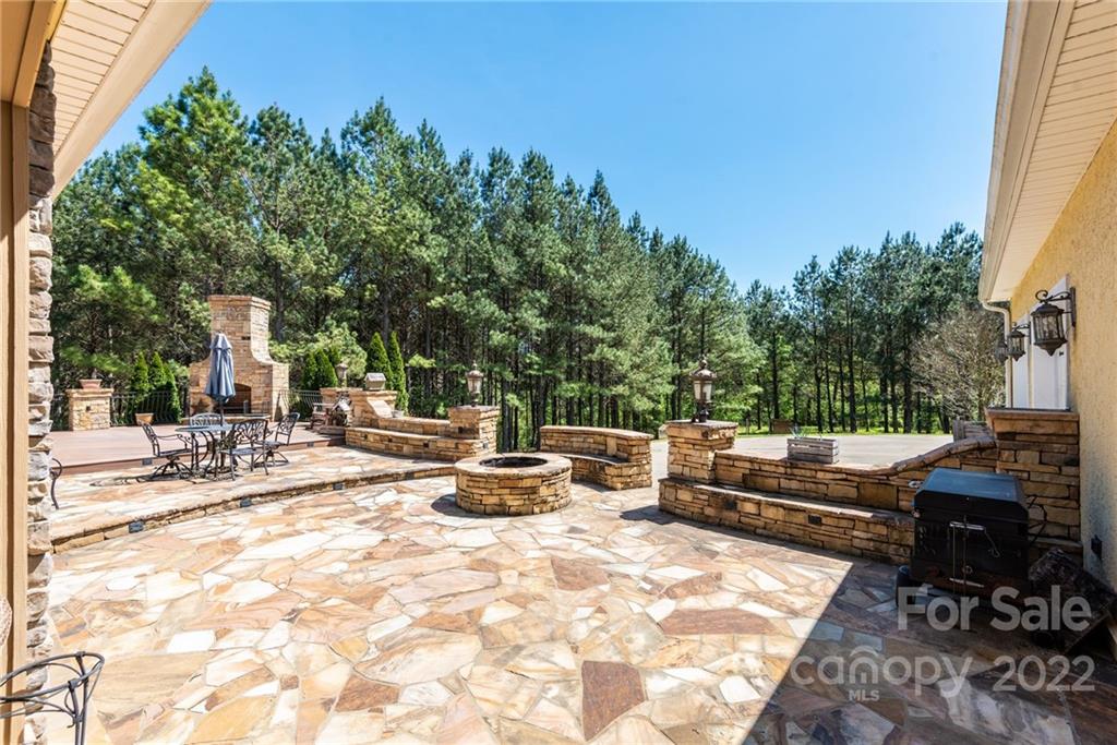 4597 Hickory Nut Ridge Road Granite Falls, NC 28630 - Photo 11 of 48 a view of backyard with sitting area