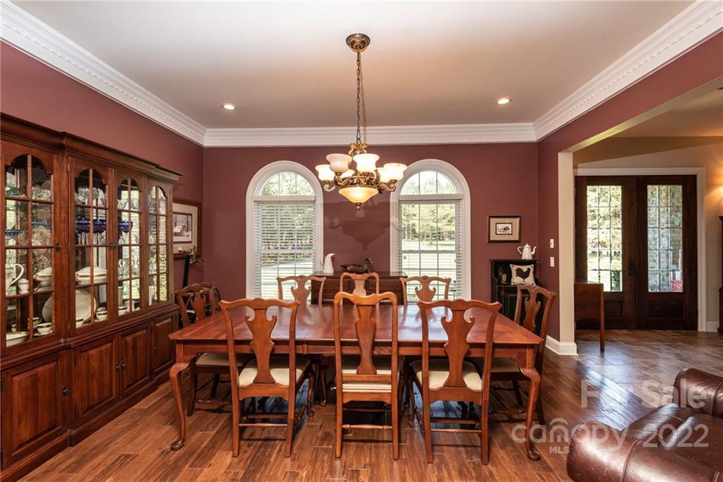4597 Hickory Nut Ridge Road Granite Falls, NC 28630 - Photo 16 of 48 a view of a dining room with furniture window and wooden floor