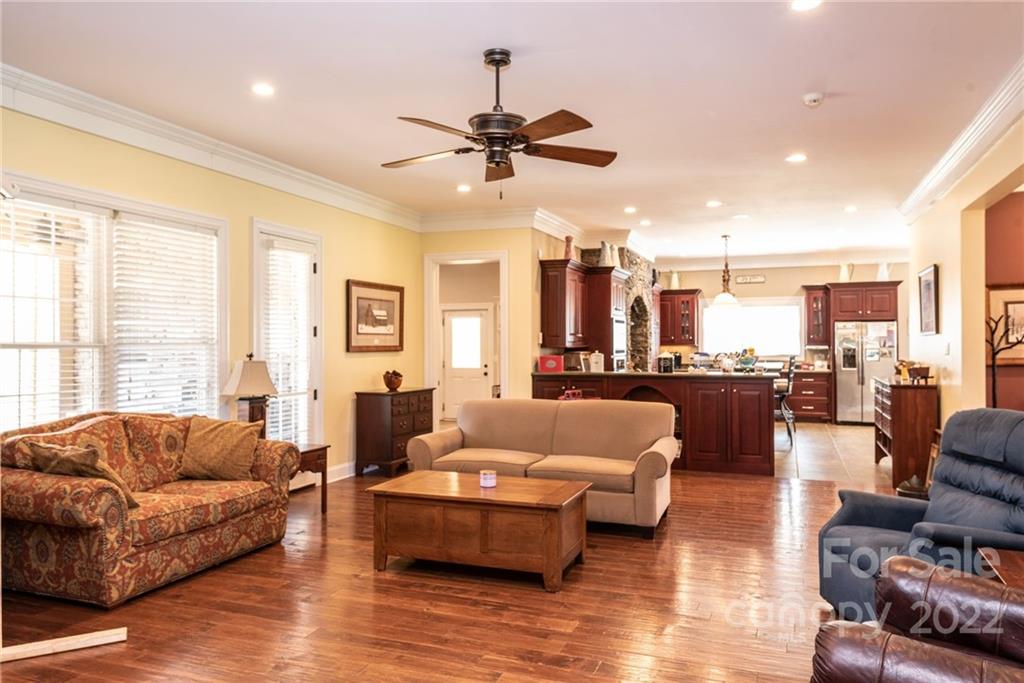 4597 Hickory Nut Ridge Road Granite Falls, NC 28630 - Photo 17 of 48 a living room with furniture and a large window