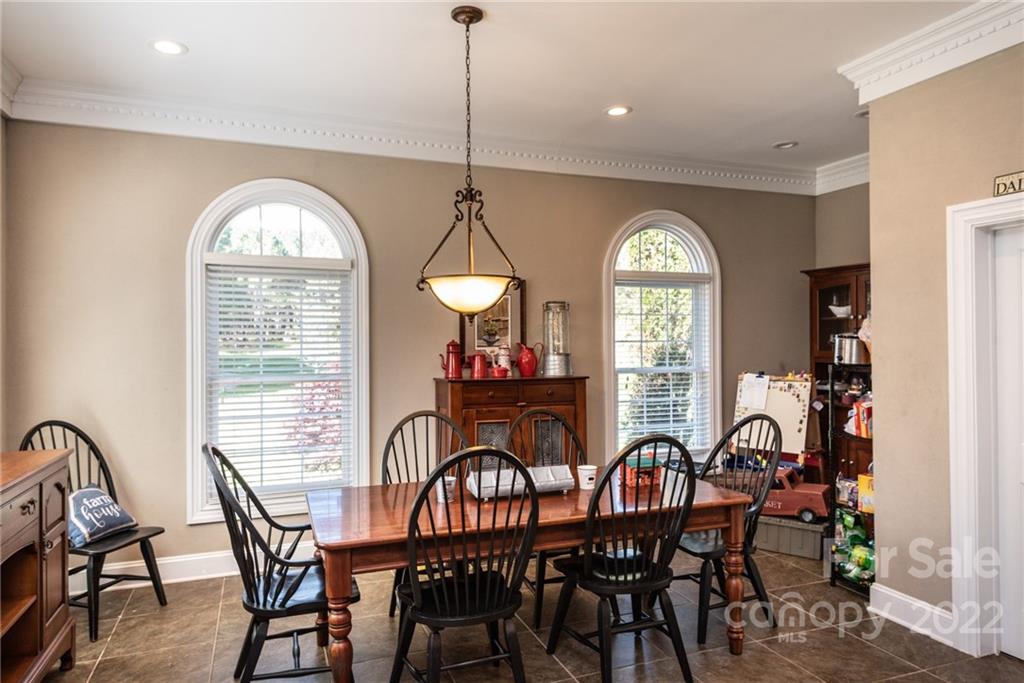 4597 Hickory Nut Ridge Road Granite Falls, NC 28630 - Photo 21 of 48 a view of a dining room with furniture window and outside view
