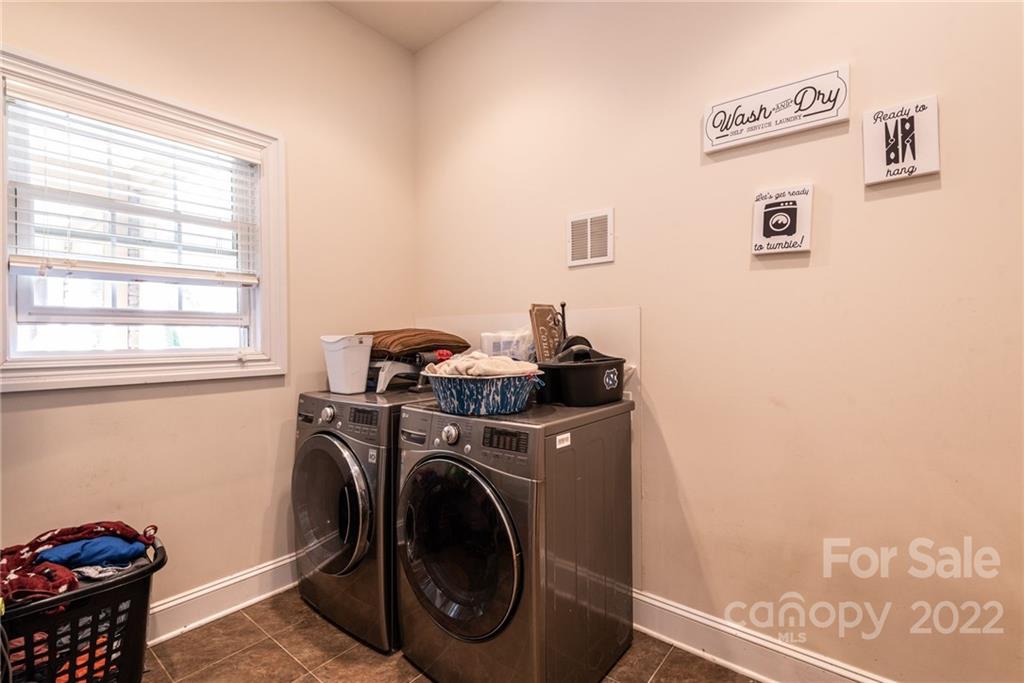 4597 Hickory Nut Ridge Road Granite Falls, NC 28630 - Photo 26 of 48 a utility room with dryer and washer