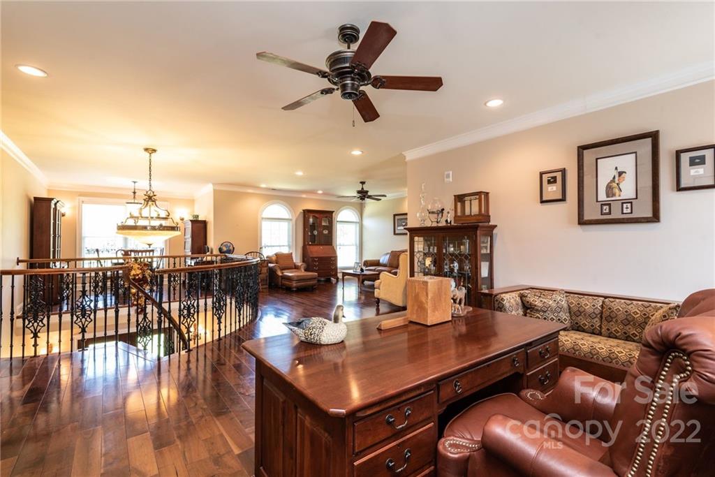 4597 Hickory Nut Ridge Road Granite Falls, NC 28630 - Photo 35 of 48 a living room with furniture and wooden floor