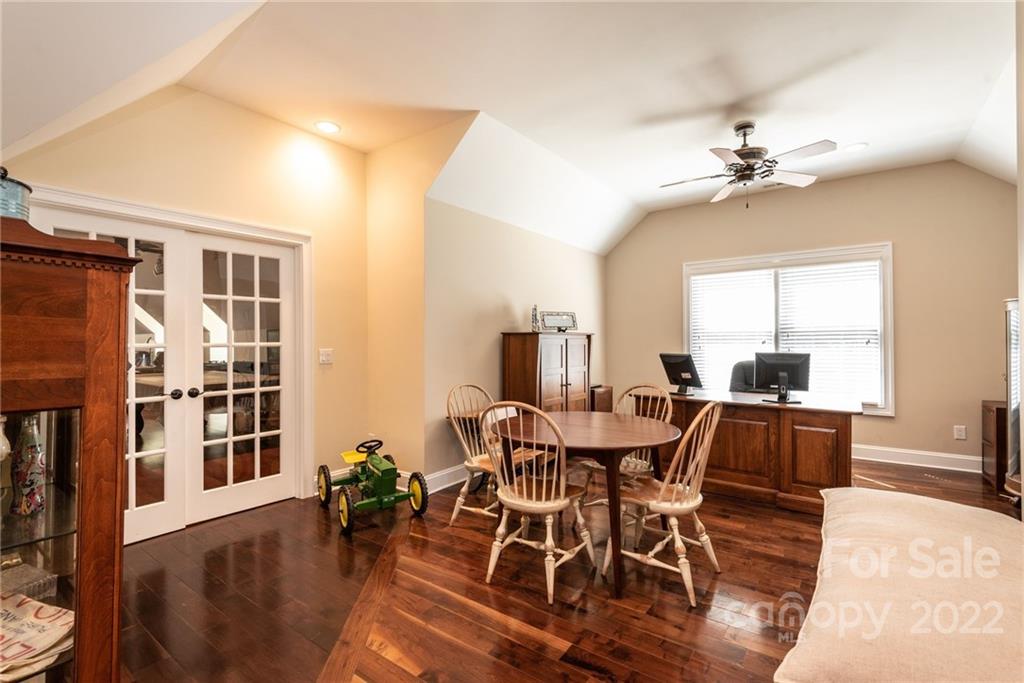 4597 Hickory Nut Ridge Road Granite Falls, NC 28630 - Photo 38 of 48 a view of a dining room with furniture and wooden floor