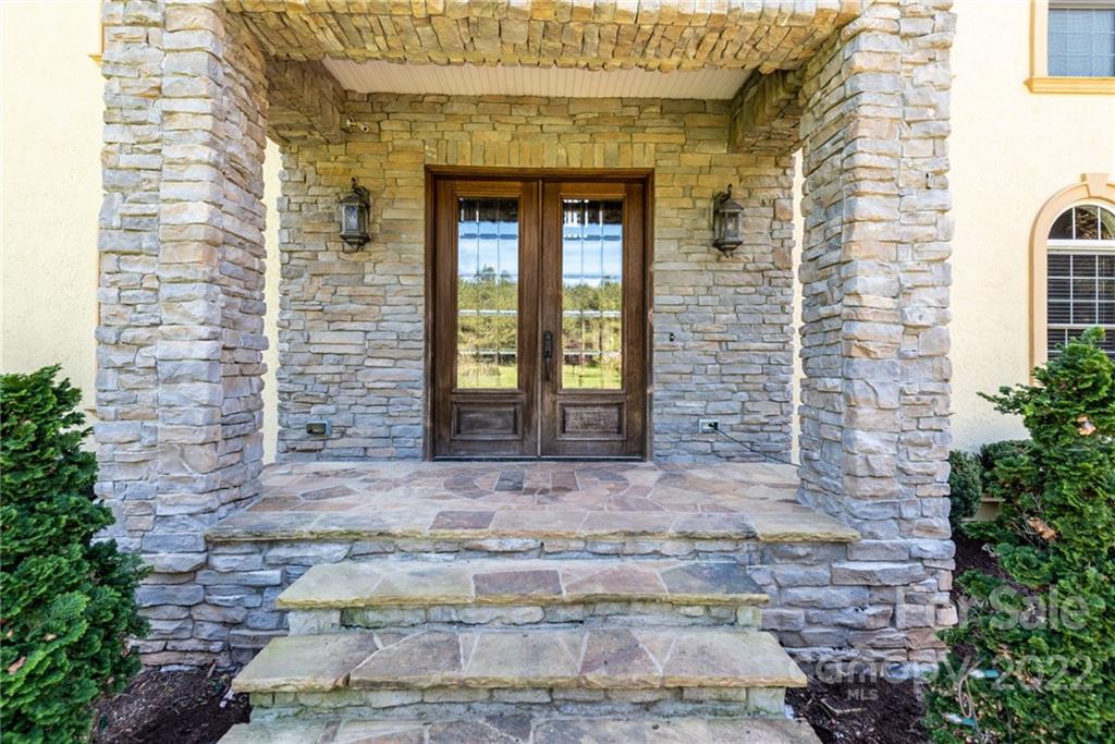 4597 Hickory Nut Ridge Road Granite Falls, NC 28630 - Photo 4 of 48 a view of front door of house