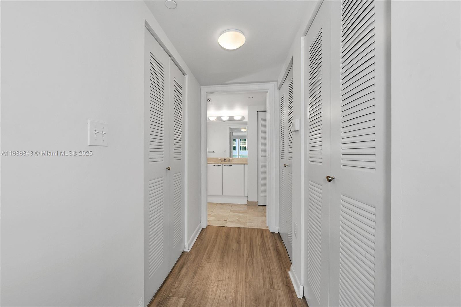 2101 Brickell Avenue, Unit 905 Miami, FL 33129 - Photo 16 of 23 a view of a hallway with wooden floor