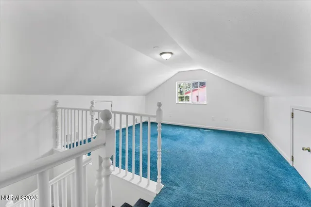 a view of a yard with a lake view