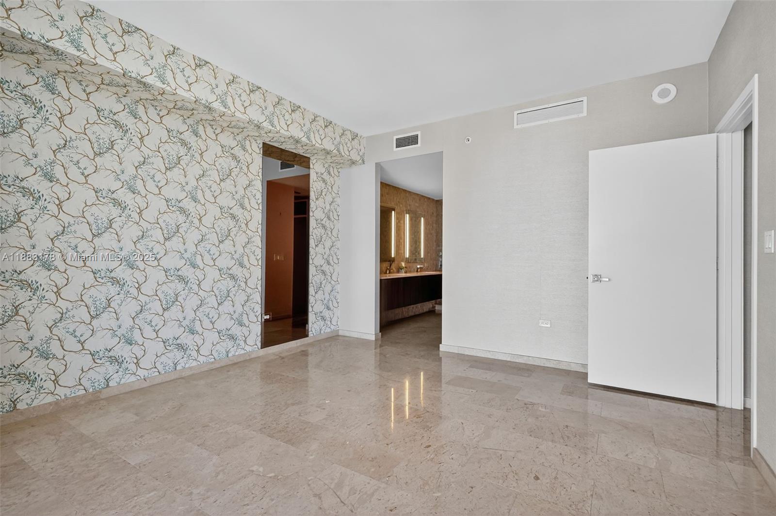 88 Southwest 7th Street, Unit 2402 Miami, FL 33130 - Photo 13 of 38 a view of a big room with closet and windows