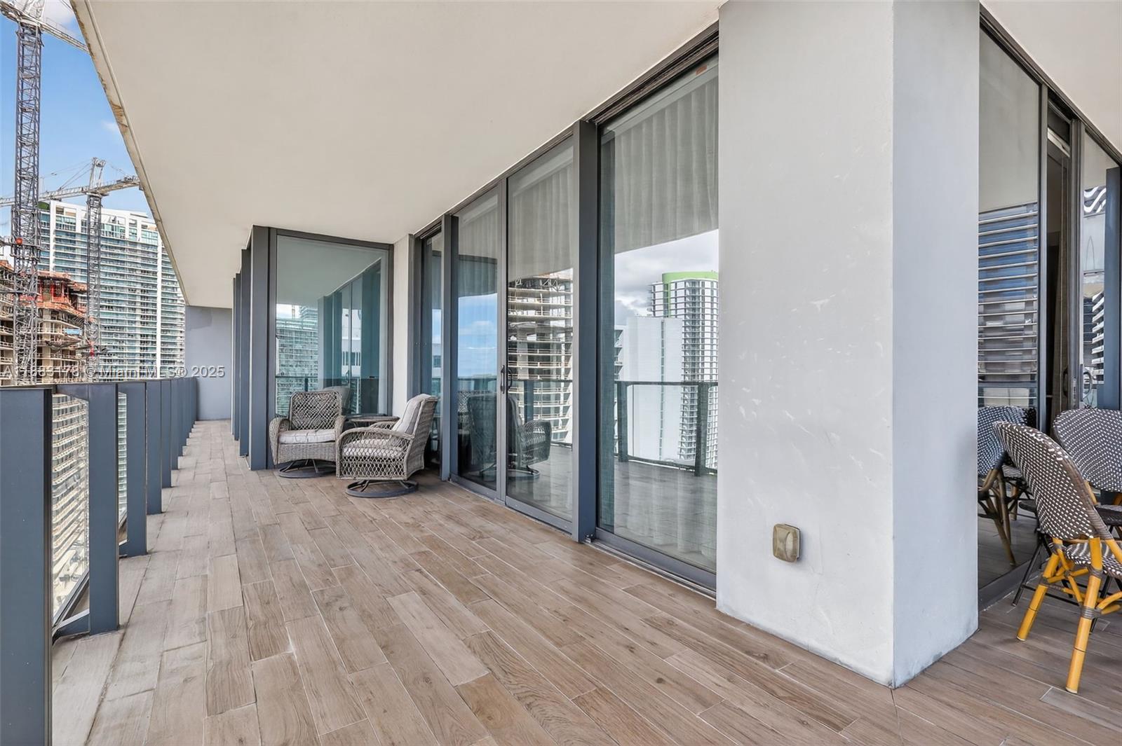 88 Southwest 7th Street, Unit 2402 Miami, FL 33130 - Photo 10 of 38 a view of a livingroom with furniture and windows