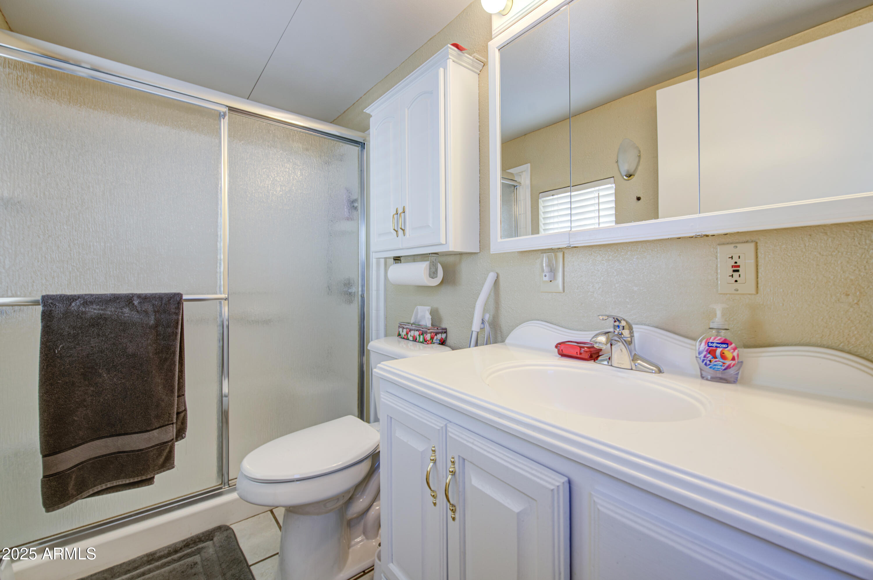 7750 East Broadway Road, Unit 780 Mesa, AZ 85208 - Photo 18 of 44 a bathroom with a sink a toilet and shower
