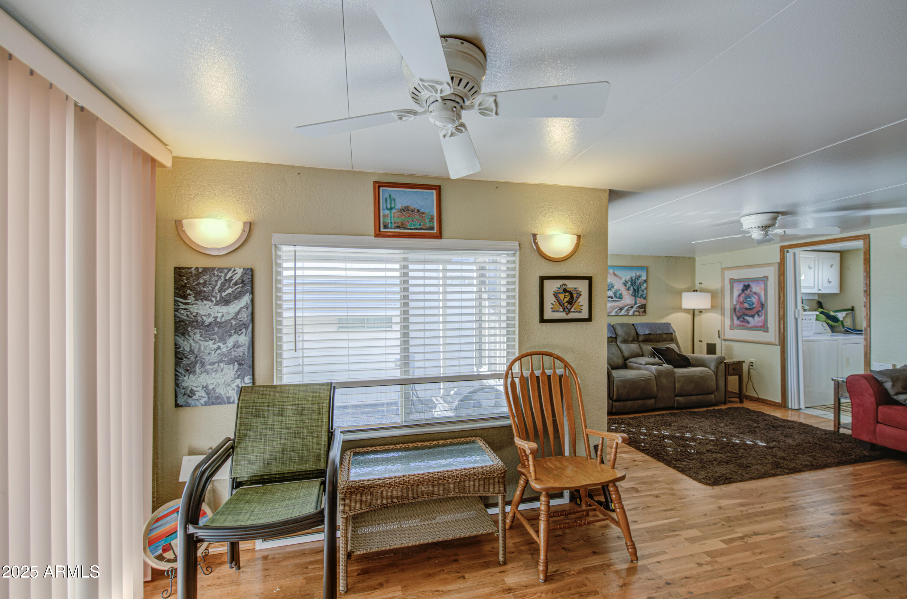 7750 East Broadway Road, Unit 780 Mesa, AZ 85208 - Photo 20 of 44 a view of a livingroom with furniture and a window