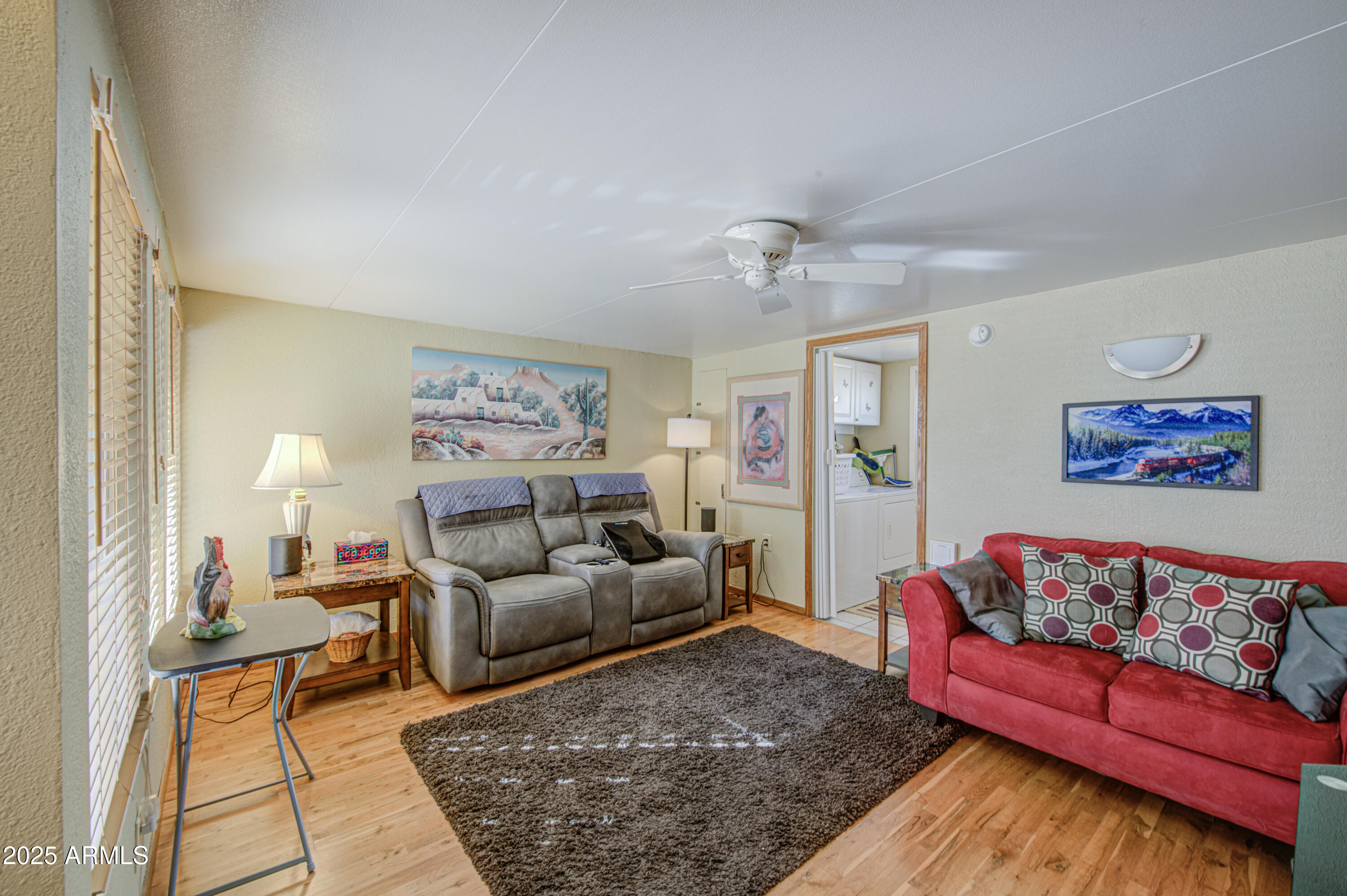 7750 East Broadway Road, Unit 780 Mesa, AZ 85208 - Photo 22 of 44 a living room with furniture and a couch