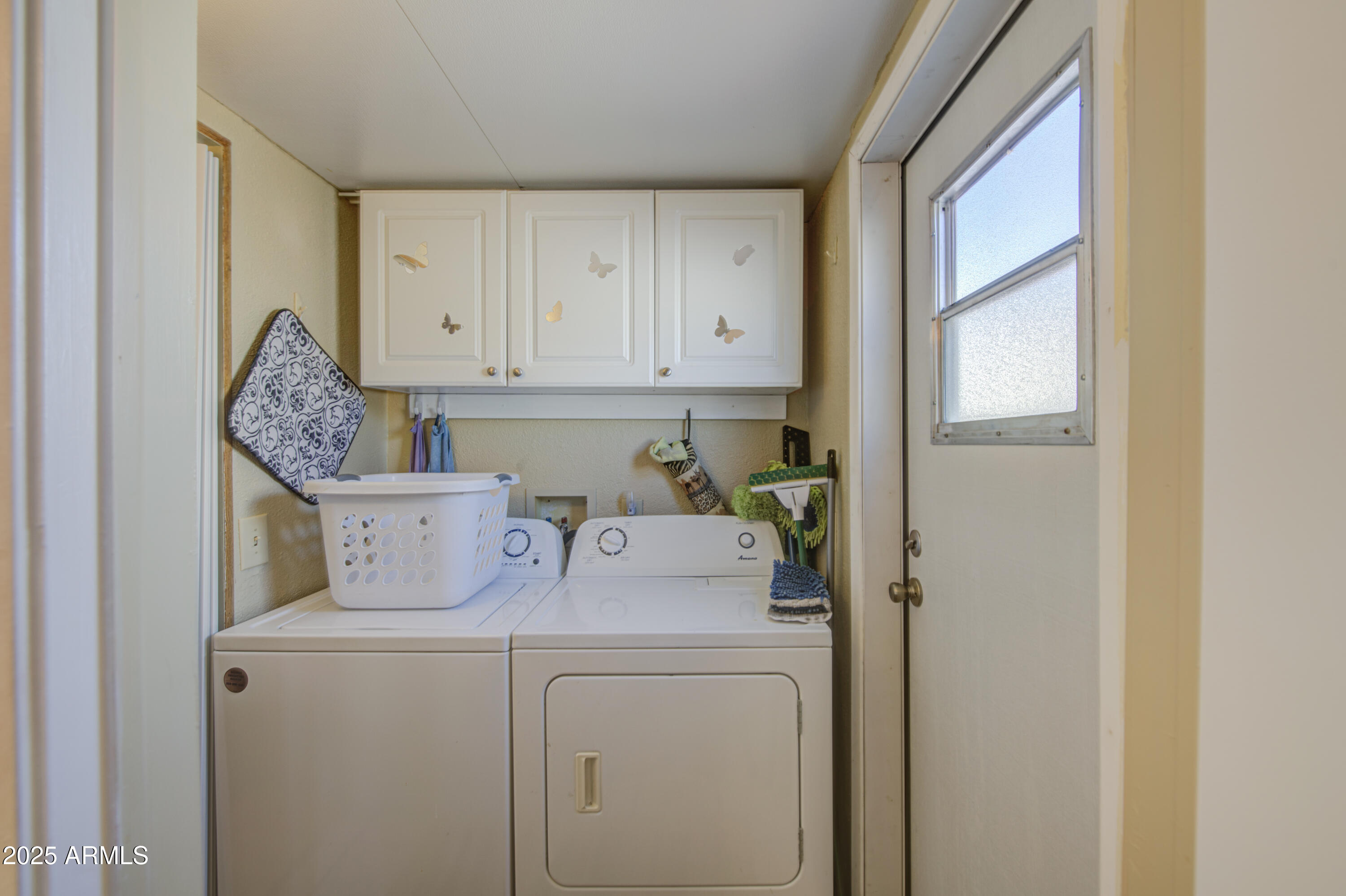7750 East Broadway Road, Unit 780 Mesa, AZ 85208 - Photo 28 of 44 a utility room with dryer and washer