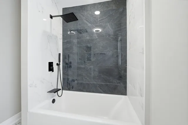 a bathroom with a bathtub