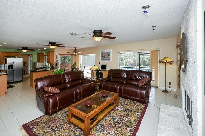 1300 Southwest 16th Street Boca Raton, FL 33486 - Photo 8 of 25 Family room wi fireplace