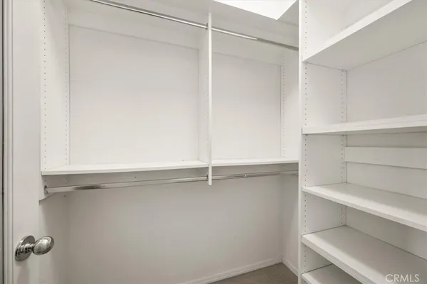 a view of an empty walk in closet