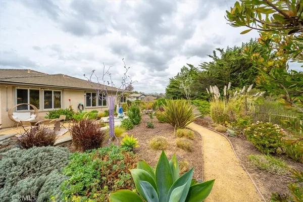 a view of a yard in front of a house
