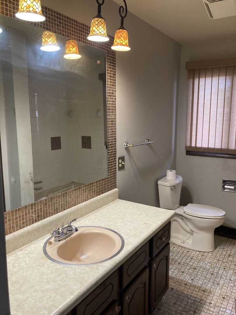 602 North 29th Road LaSalle, IL 61301 - Photo 14 of 28 a bathroom with a sink and a mirror