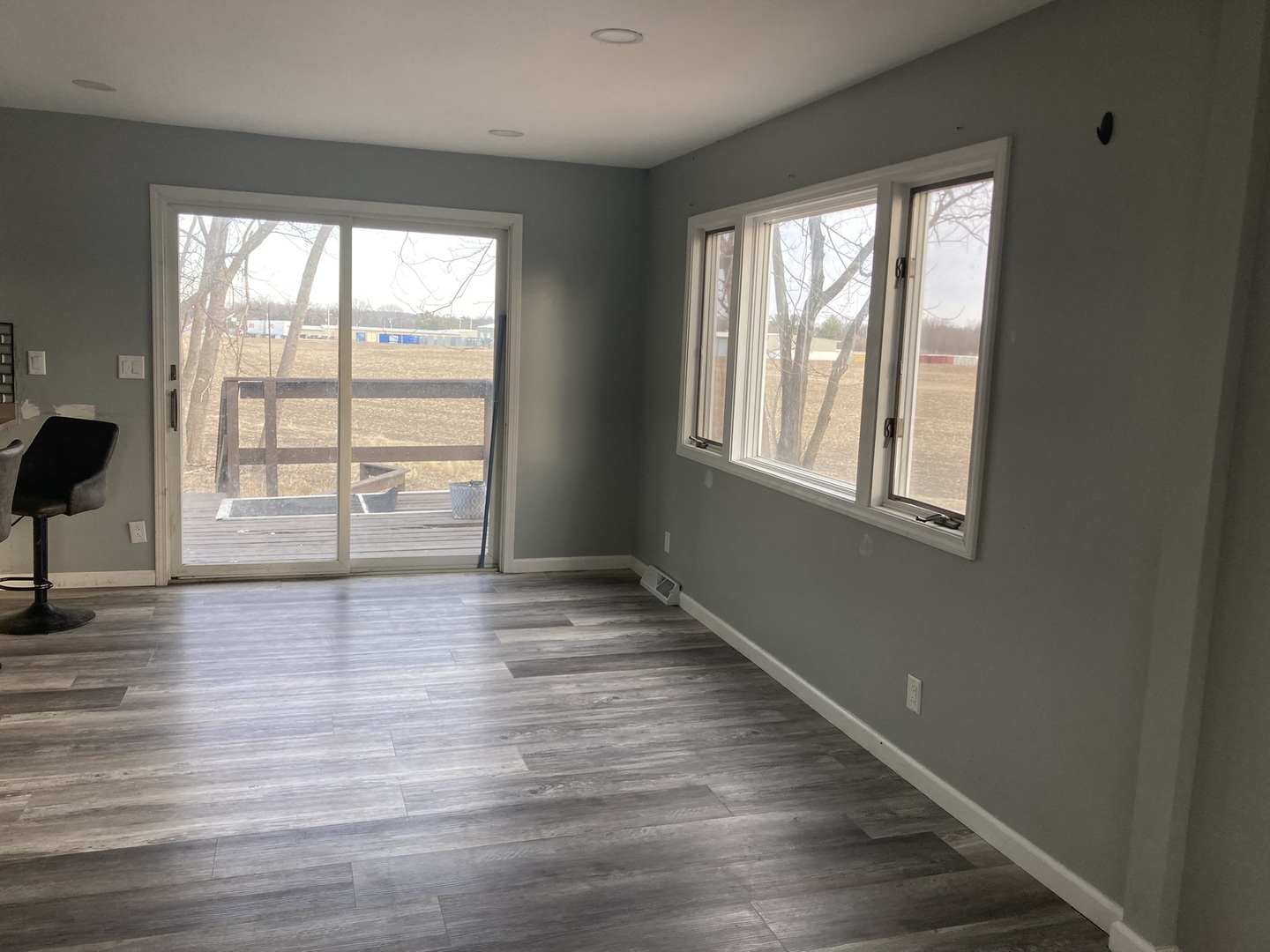 602 North 29th Road LaSalle, IL 61301 - Photo 8 of 28 an empty room with wooden floor and windows