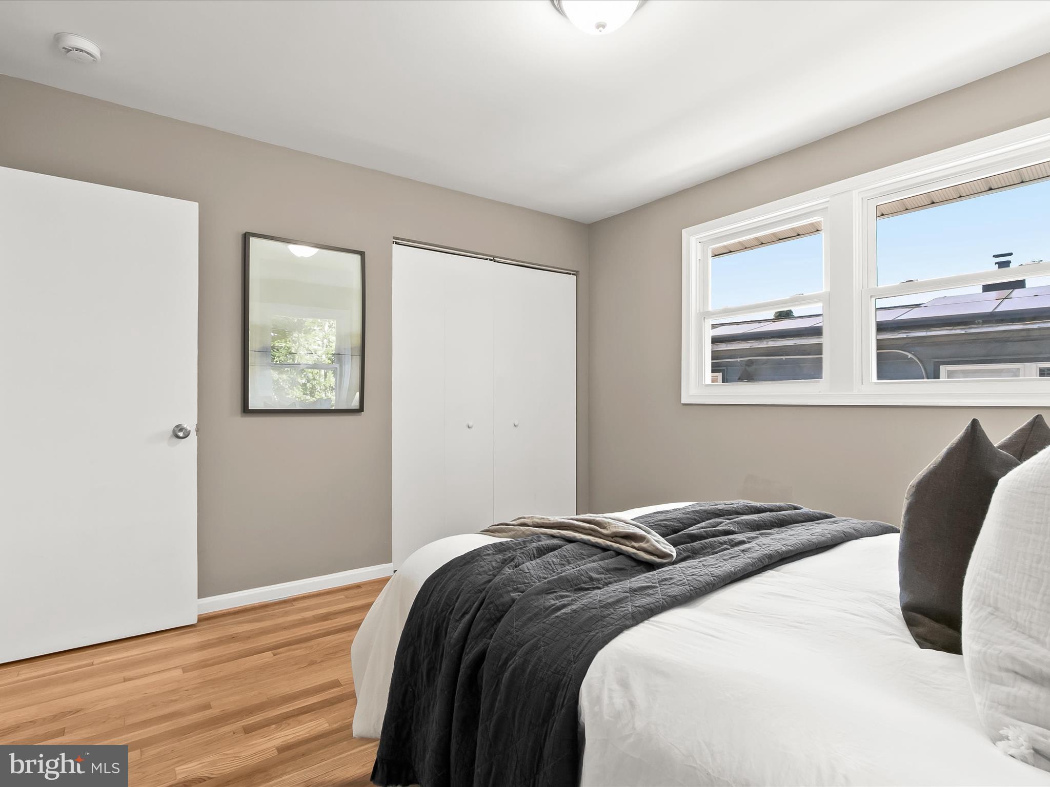 13211 Holdridge Road Silver Spring, MD 20906 - Photo 14 of 32 a bedroom with bed and a window
