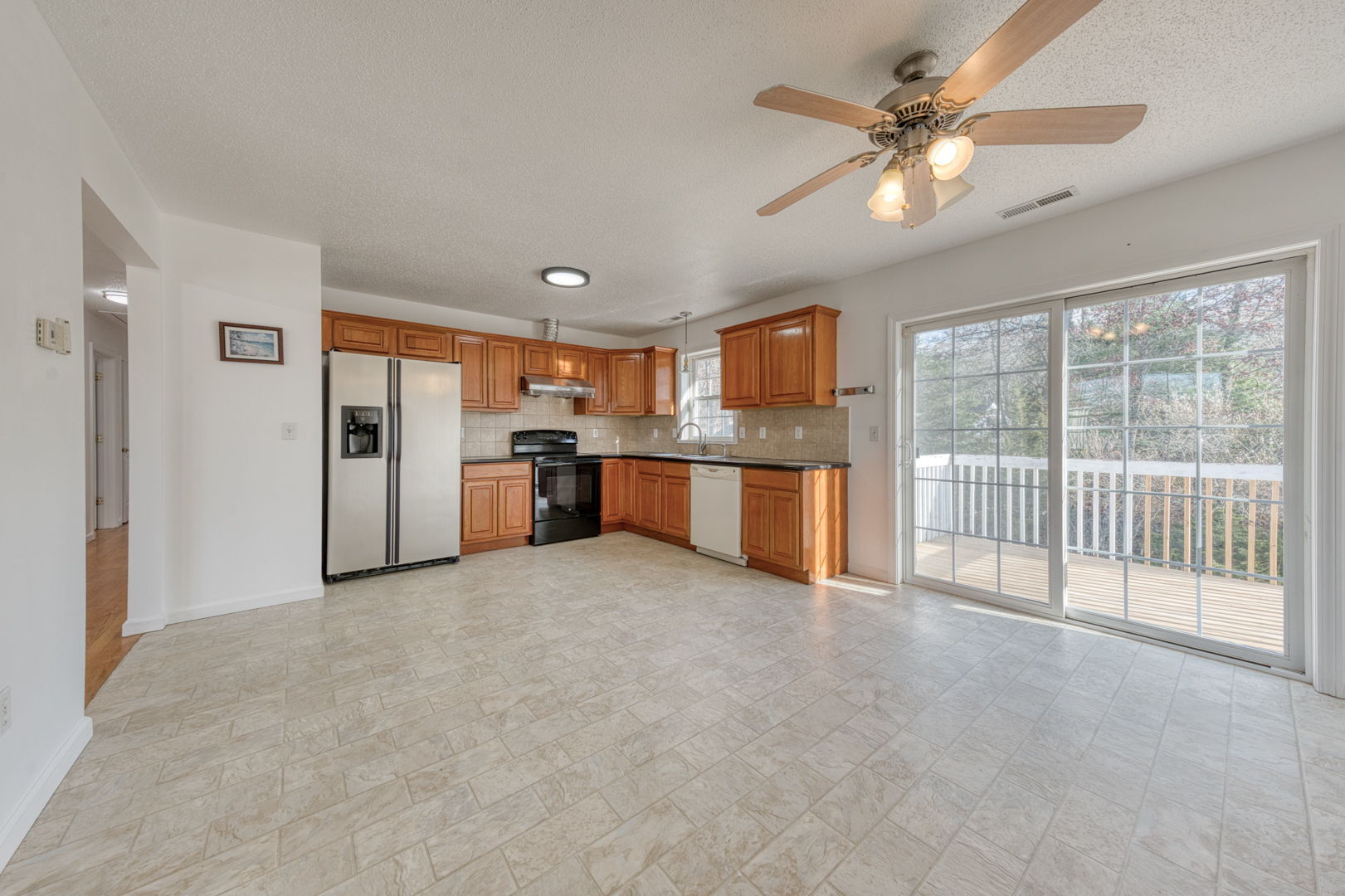 27 Aspen Place Windham, CT 06226 - Photo 11 of 39 a view of a kitchen with a stove cabinets and a kitchen