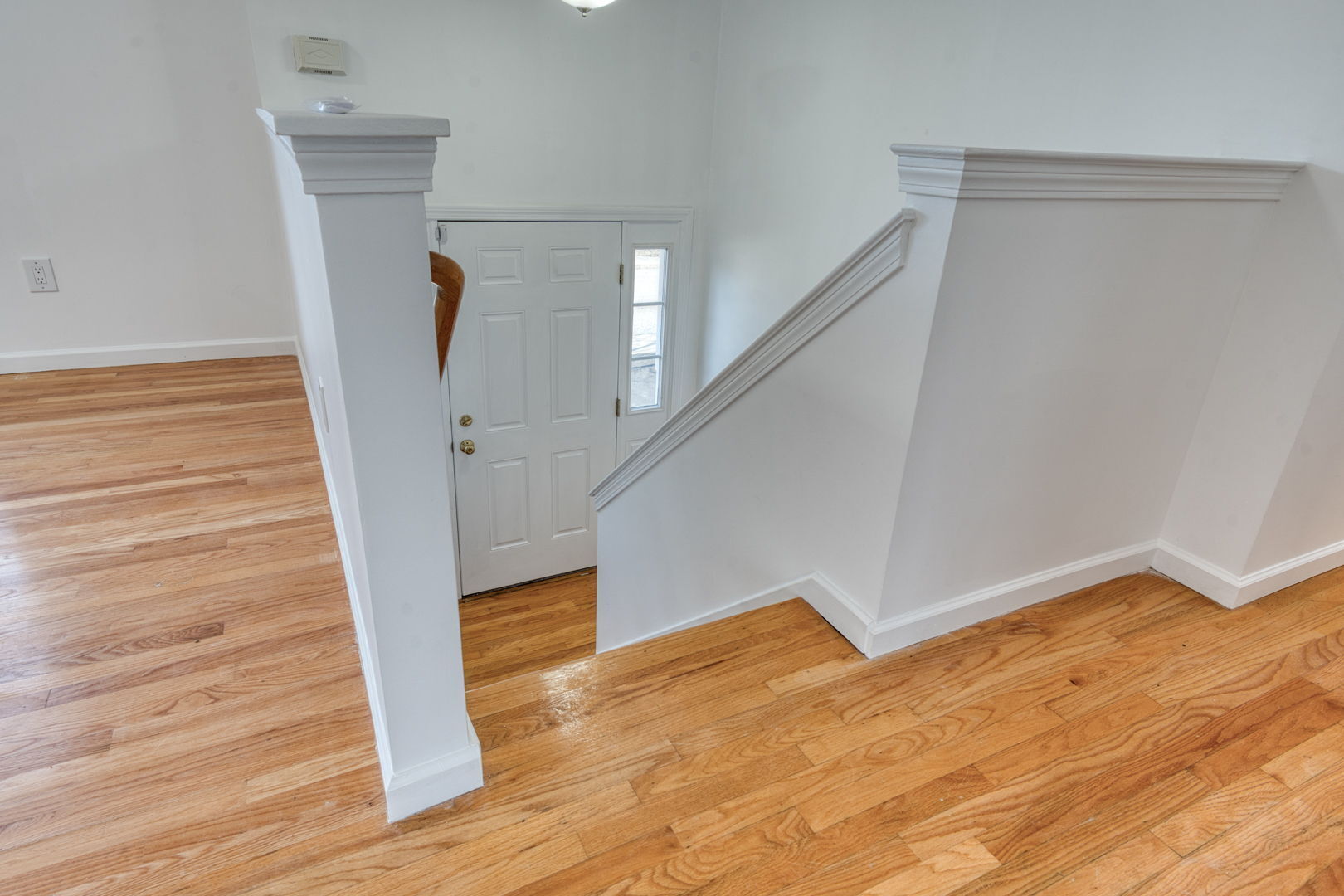 27 Aspen Place Windham, CT 06226 - Photo 8 of 39 a view of entryway and hall with wooden floor