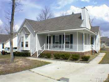 4532 Whistling Way Raleigh, NC 27616 - Photo 1 of 1 a front view of a house with a yard