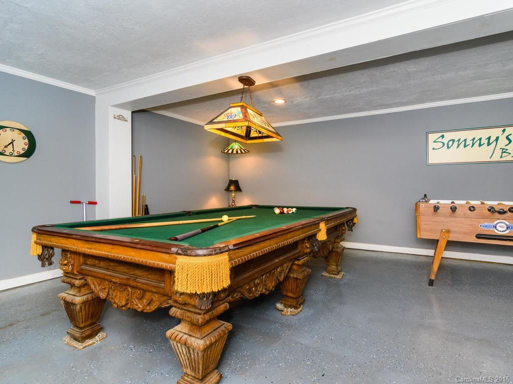 27 High Ridge Road Leicester, NC 28748 - Photo 17 of 24 a room with pool tables and furniture