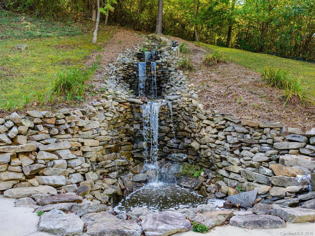 27 High Ridge Road Leicester, NC 28748 - Photo 18 of 24 a view of a pathway with a yard