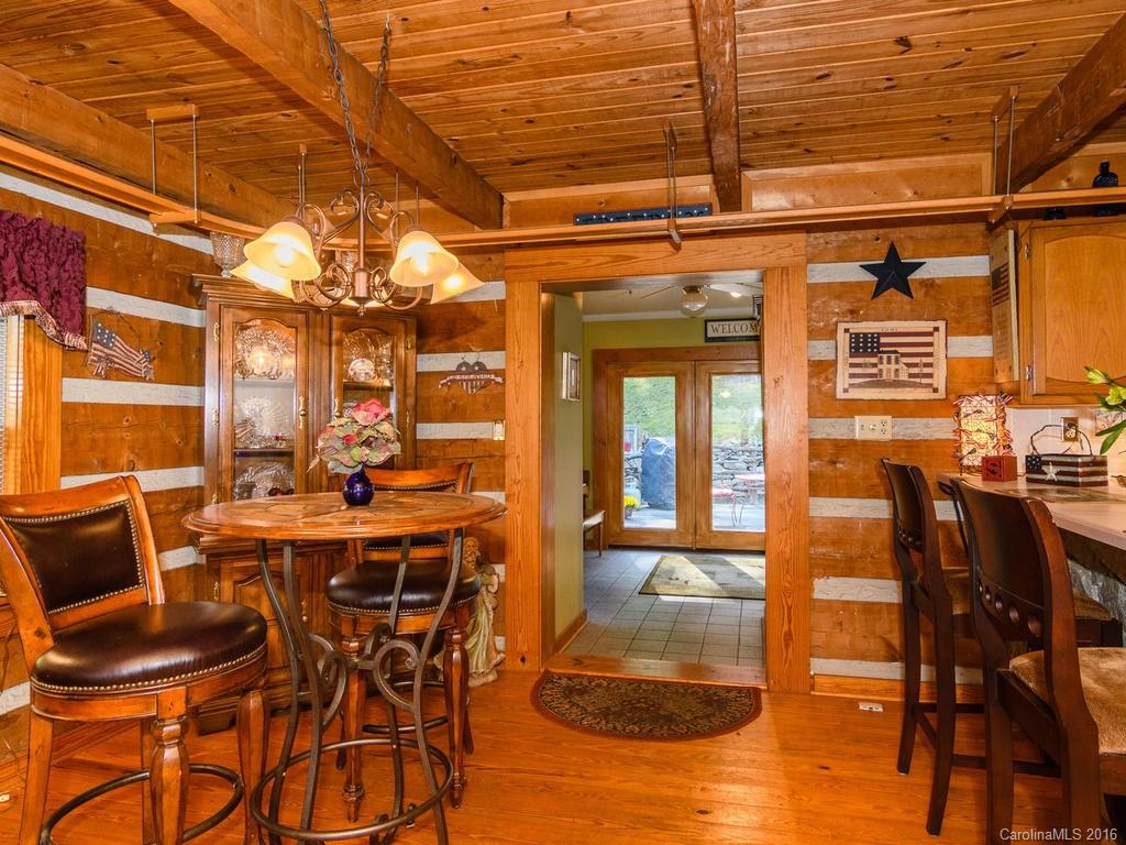 27 High Ridge Road Leicester, NC 28748 - Photo 10 of 24 a view of a dining room with furniture and chandelier