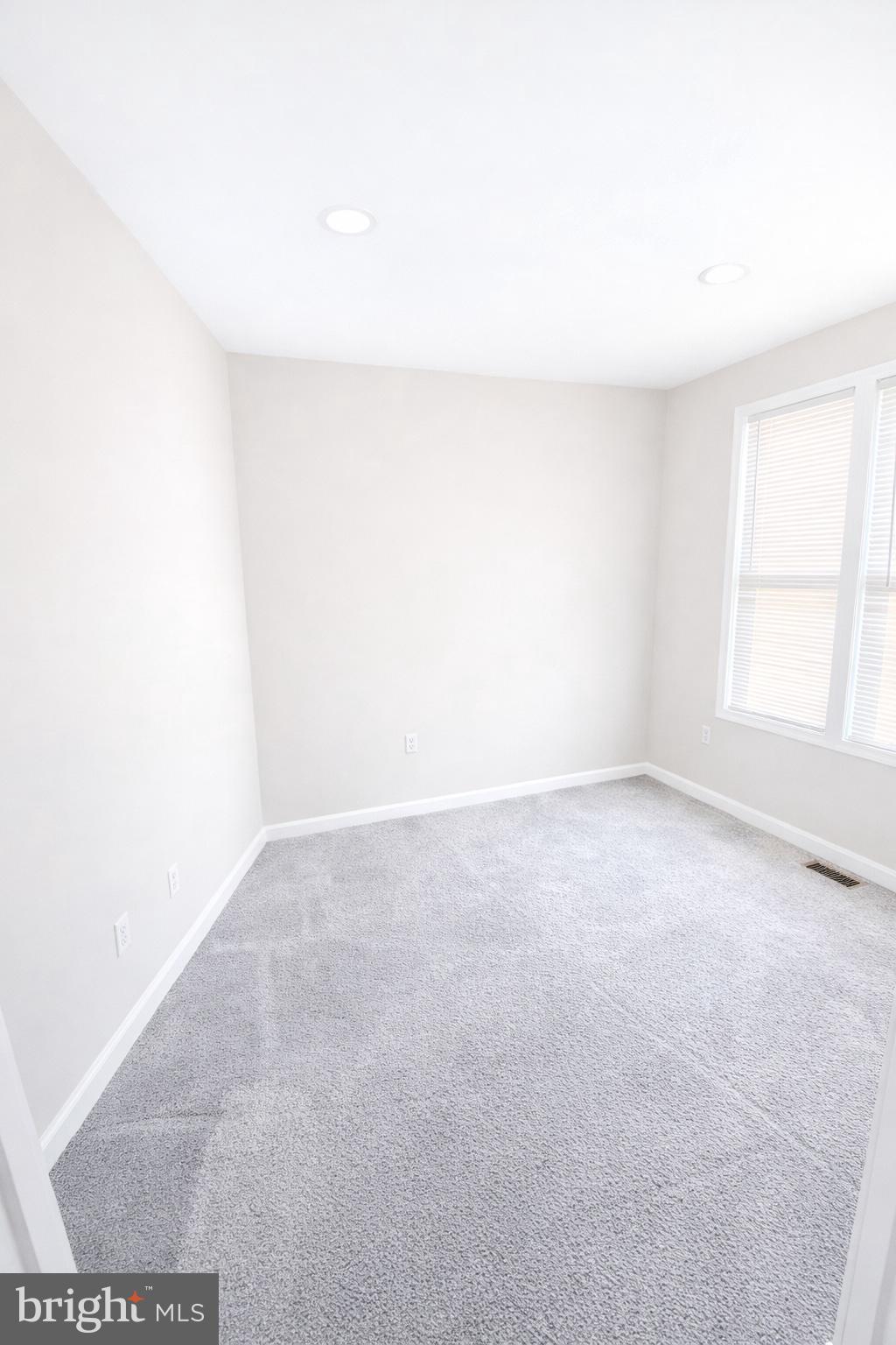 238 North Rose Street Baltimore, MD 21224 - Photo 7 of 7 a view of an empty room and window