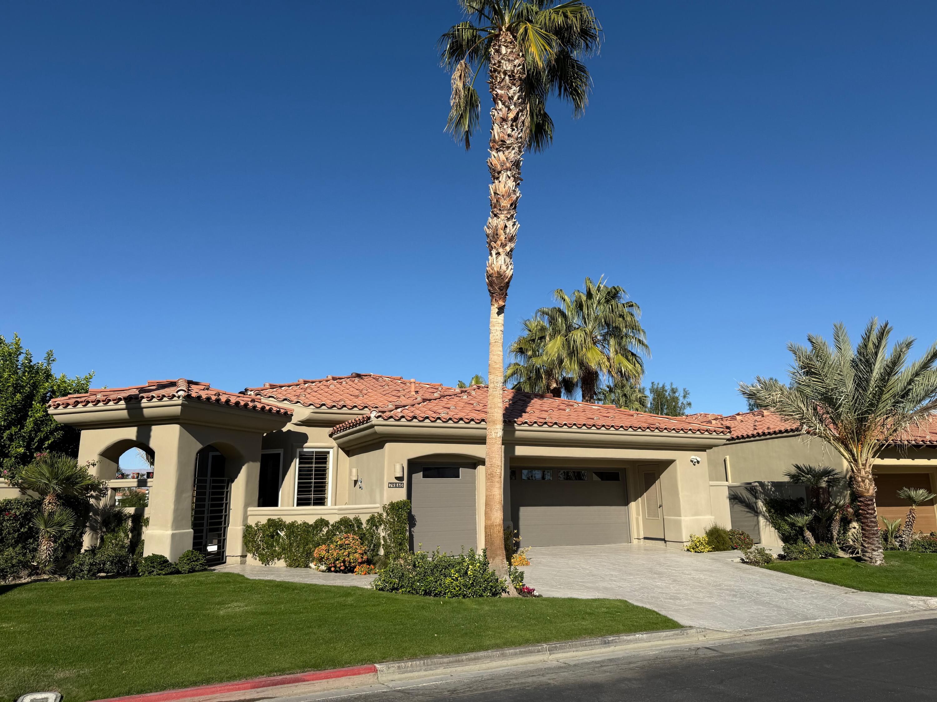 79860 Tangelo La Quinta, CA 92253 - Photo 2 of 2 a front view of a house with a yard
