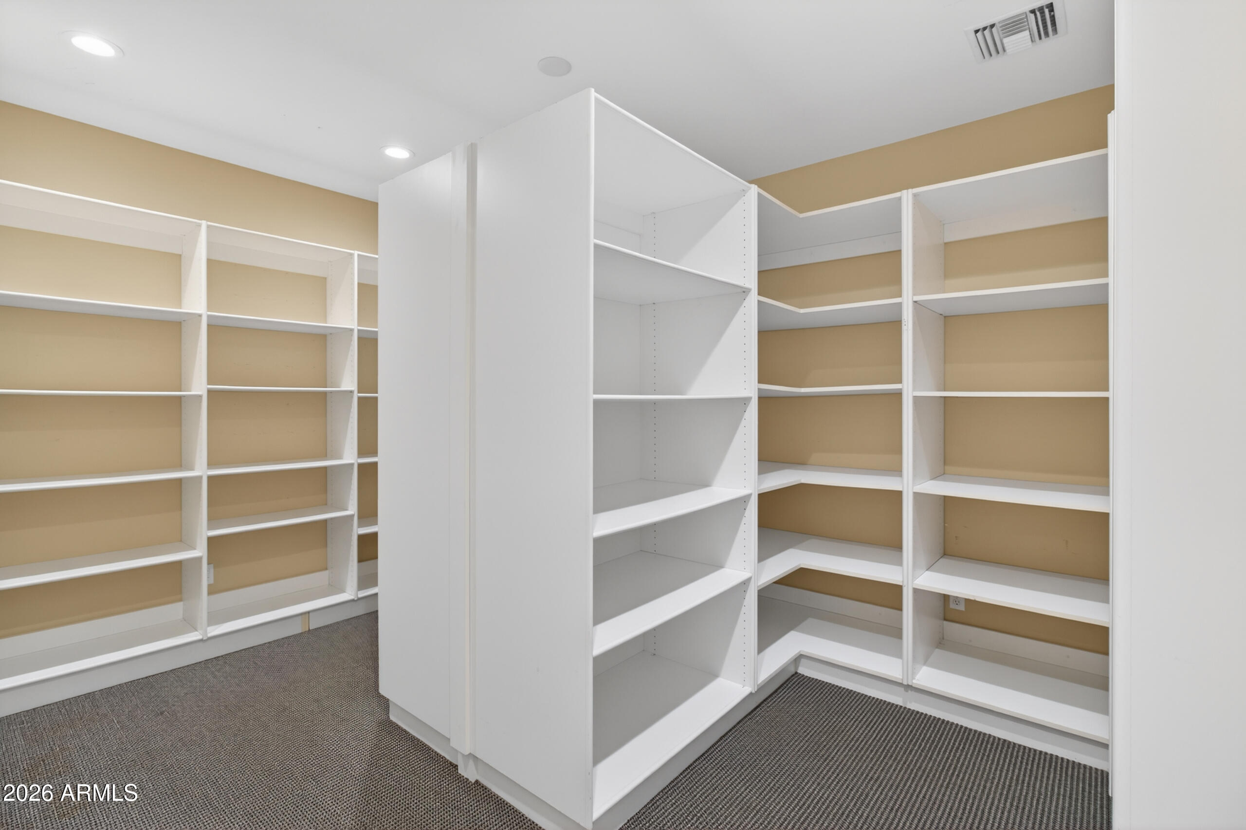2677 East Queen Creek Road Gilbert, AZ 85297 - Photo 82 of 128 a view of an empty room with empty shelves