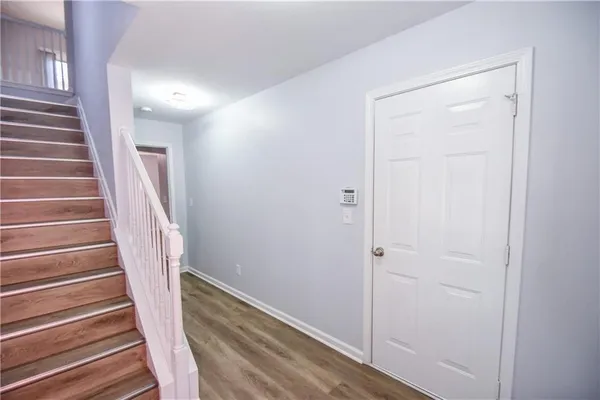 a view of an empty room with a window