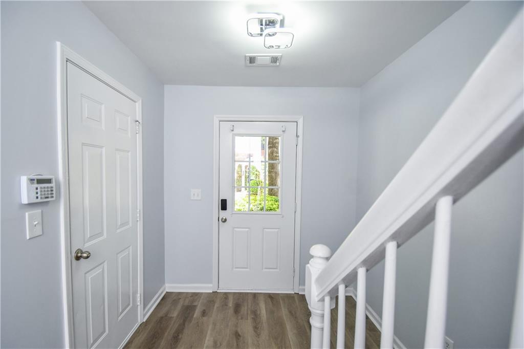 2201 Landing Walk Drive Duluth, GA 30097 - Photo 18 of 80 a view of an entryway with wooden floor