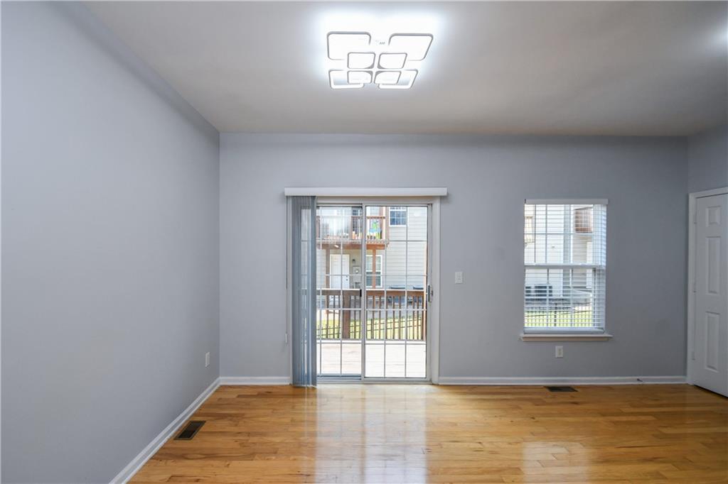 2201 Landing Walk Drive Duluth, GA 30097 - Photo 31 of 80 a view of an empty room with a window