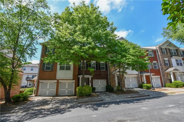a front view of a multi story residential apartment buildings