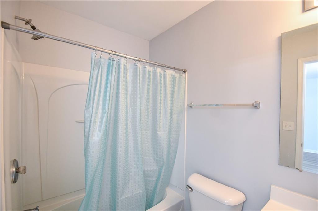 2201 Landing Walk Drive Duluth, GA 30097 - Photo 48 of 80 a bathroom with a shower and a toilet
